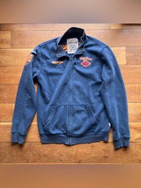 Triumph Navy Full-Zip Sweatshirt with Orange Accents